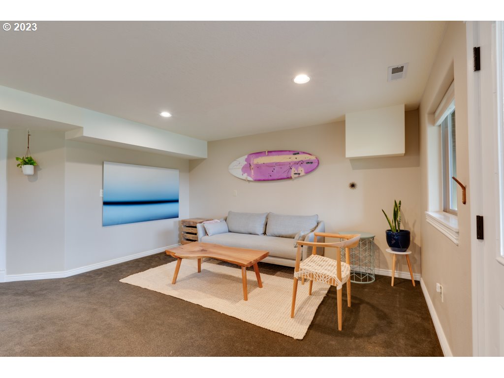 3250 P Street Washougal, WA 98671 - Photo 34 of 48 a living room with furniture and a rug