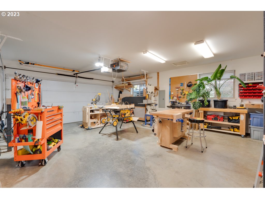 3250 P Street Washougal, WA 98671 - Photo 39 of 48 a living room with lots of furniture and clutter