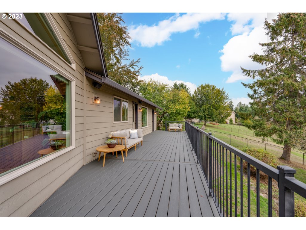 3250 P Street Washougal, WA 98671 - Photo 42 of 48 a balcony with wooden floor and outdoor seating