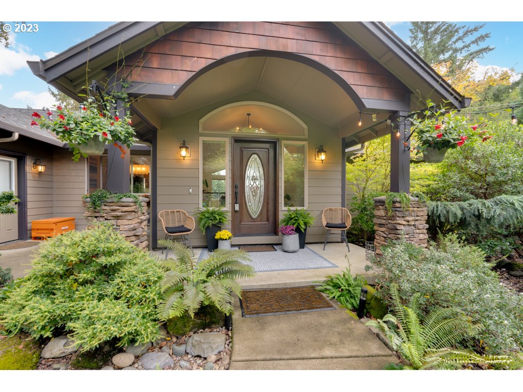 3250 P Street Washougal, WA 98671 - Photo 5 of 48 a view of a house with potted plants