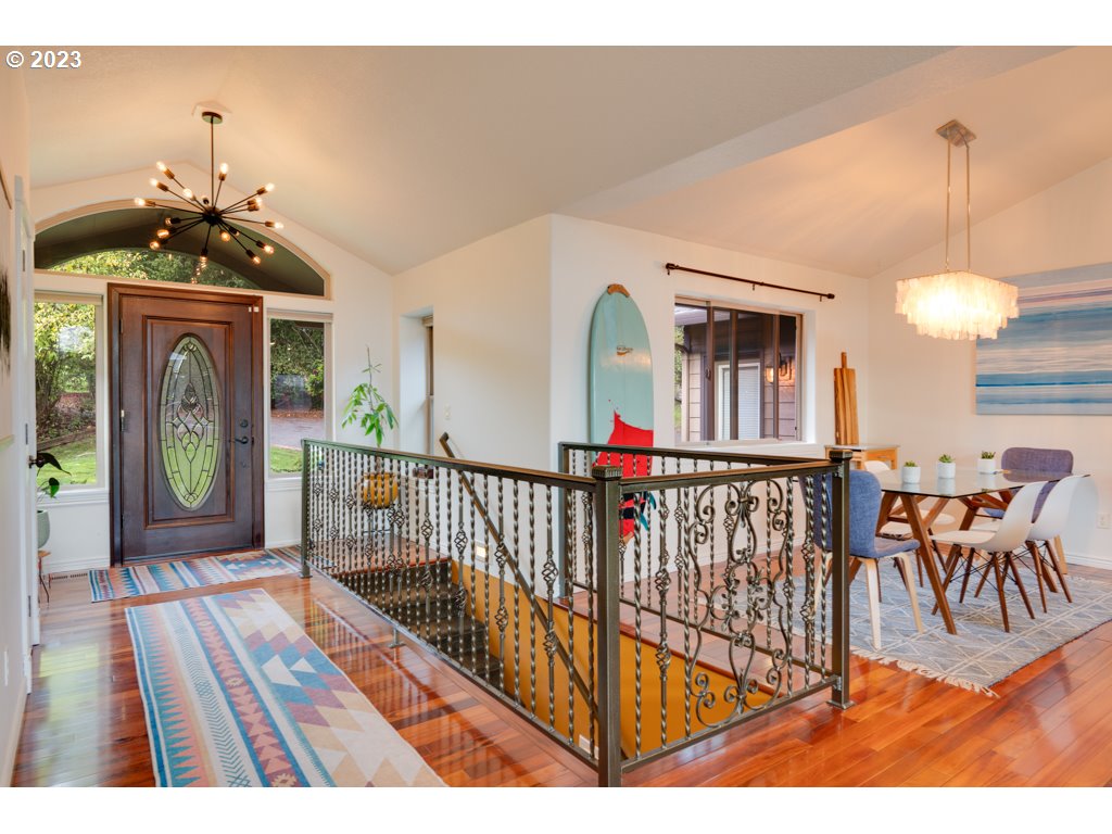3250 P Street Washougal, WA 98671 - Photo 6 of 48 a view of a dining room with furniture window and wooden floor