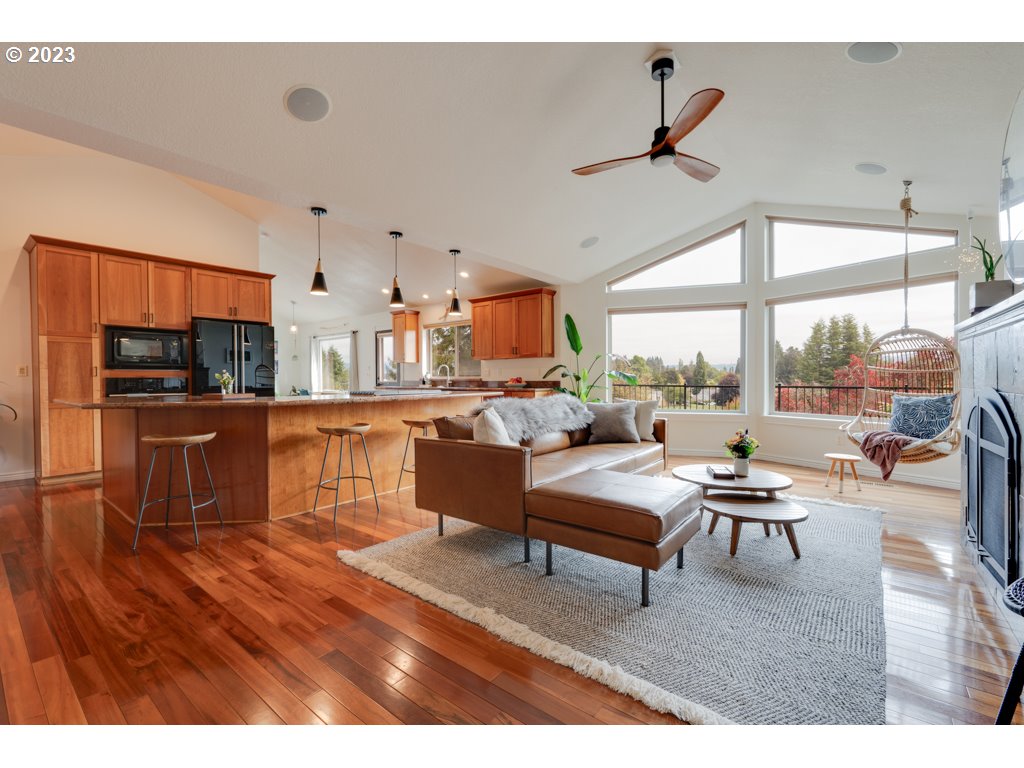 3250 P Street Washougal, WA 98671 - Photo 7 of 48 a living room with stainless steel appliances kitchen island granite countertop furniture and a large window