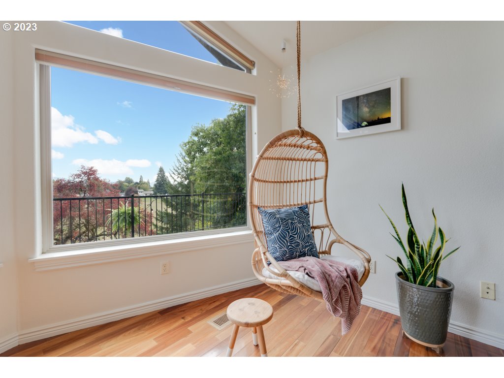 3250 P Street Washougal, WA 98671 - Photo 9 of 48 a vase of flowers sitting next to a window