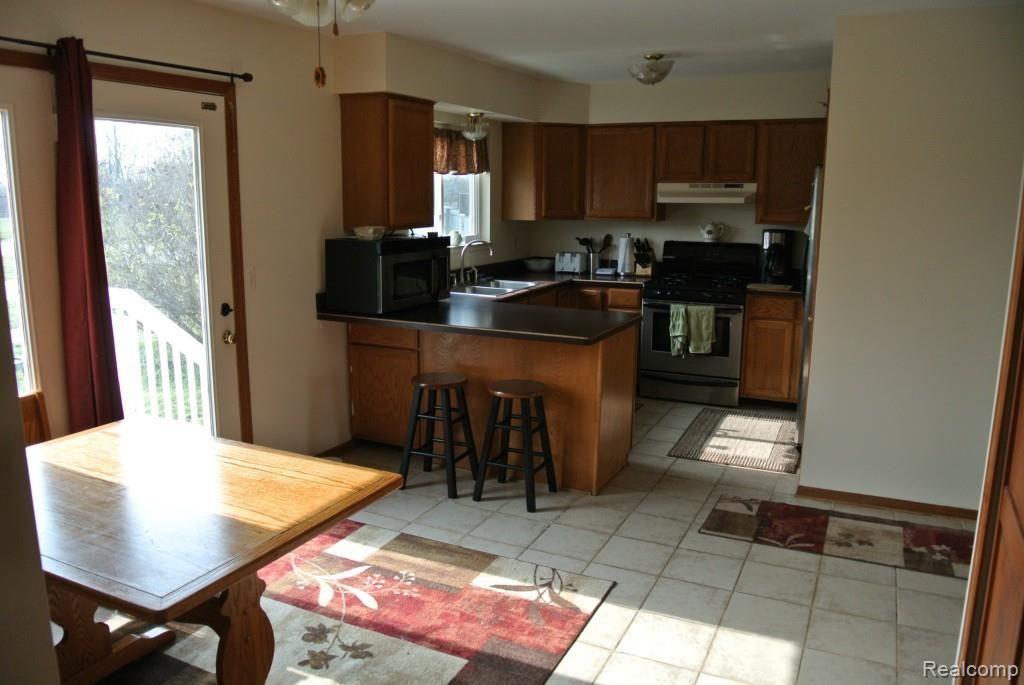 8772 Almont Road Almont, MI 48003 - Photo 6 of 10 Kitchen Dining area.jpg