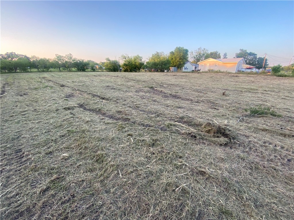 1 Beaver Street Riesel, TX 76682 - Photo 6 of 7 a view of a dry yard with trees