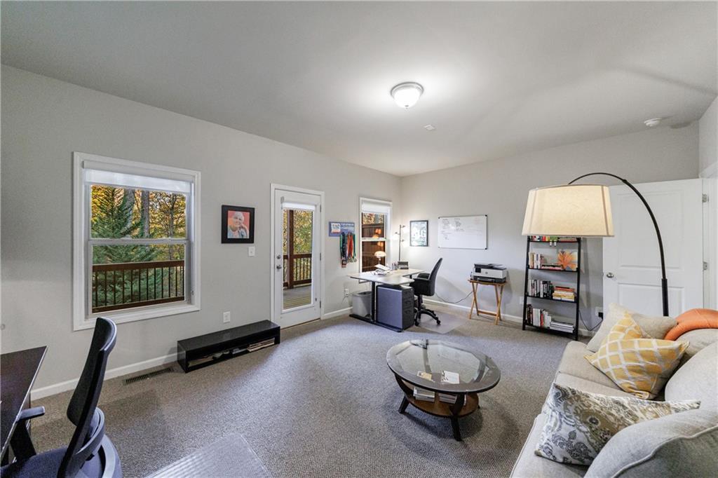 2002 Raven Way Atlanta, GA 30341 - Photo 12 of 27 a living room with furniture and a large window