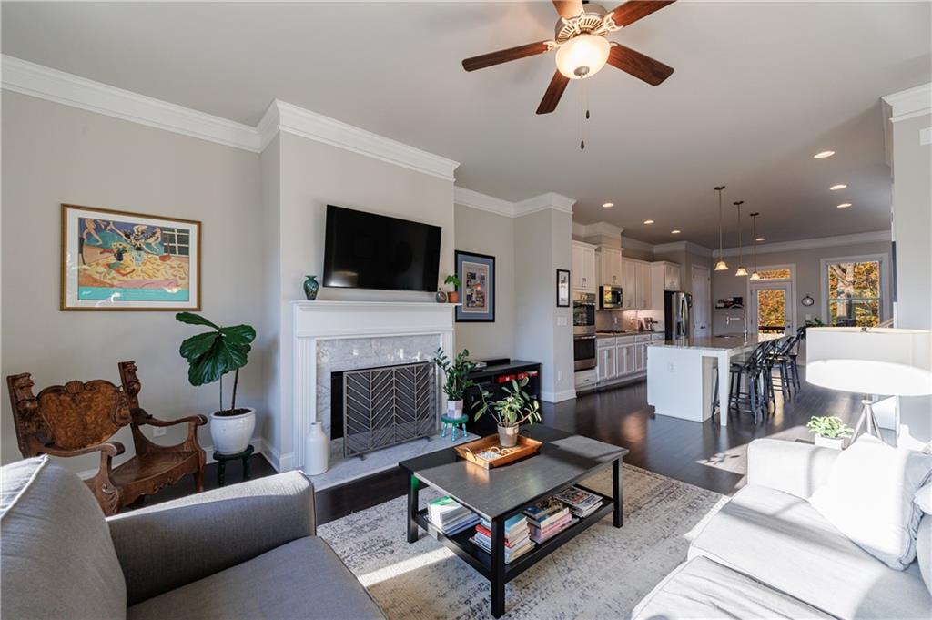 2002 Raven Way Atlanta, GA 30341 - Photo 2 of 27 a living room with furniture a fireplace and a flat screen tv