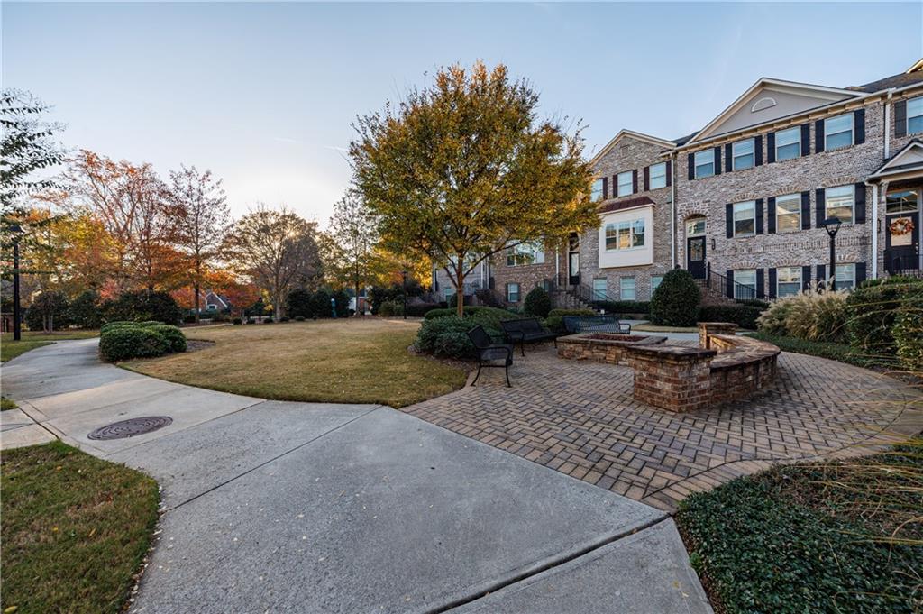 2002 Raven Way Atlanta, GA 30341 - Photo 21 of 27 a view of pool with outdoor seating and plants