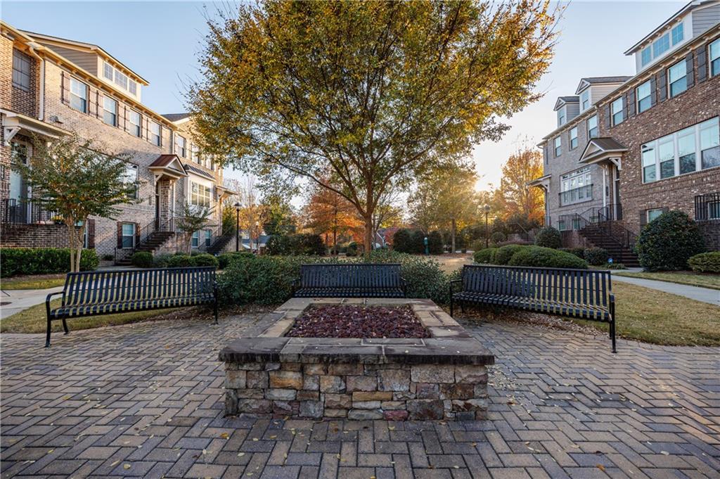 2002 Raven Way Atlanta, GA 30341 - Photo 22 of 27 a view of a patio with a bench in a patio