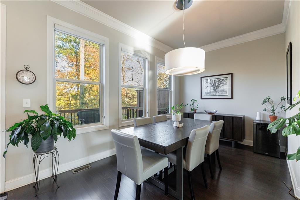 2002 Raven Way Atlanta, GA 30341 - Photo 4 of 27 a view of a dining room with furniture window and wooden floor