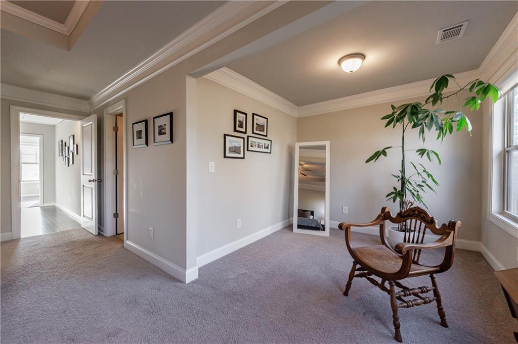 2002 Raven Way Atlanta, GA 30341 - Photo 7 of 27 a view of a livingroom with furniture and a potted plant