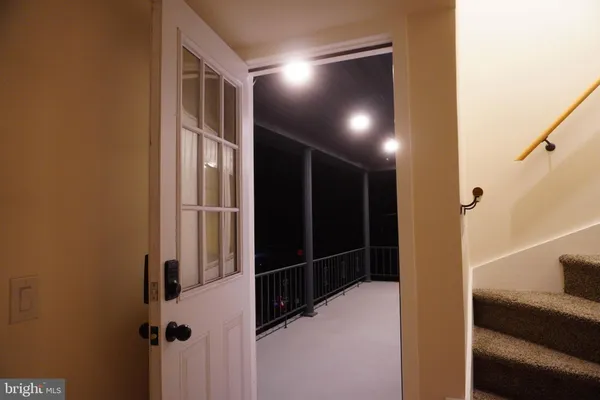 a kitchen with stainless steel appliances granite countertop a stove and a refrigerator