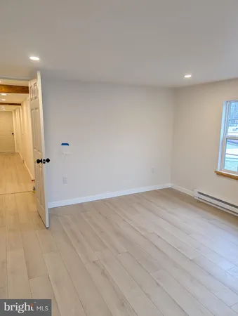 a bathroom with a sink vanity and a mirror
