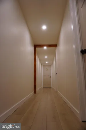 a en suite bathroom with a sink shower and a mirror