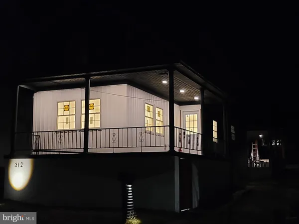 a view of a car in front of a house