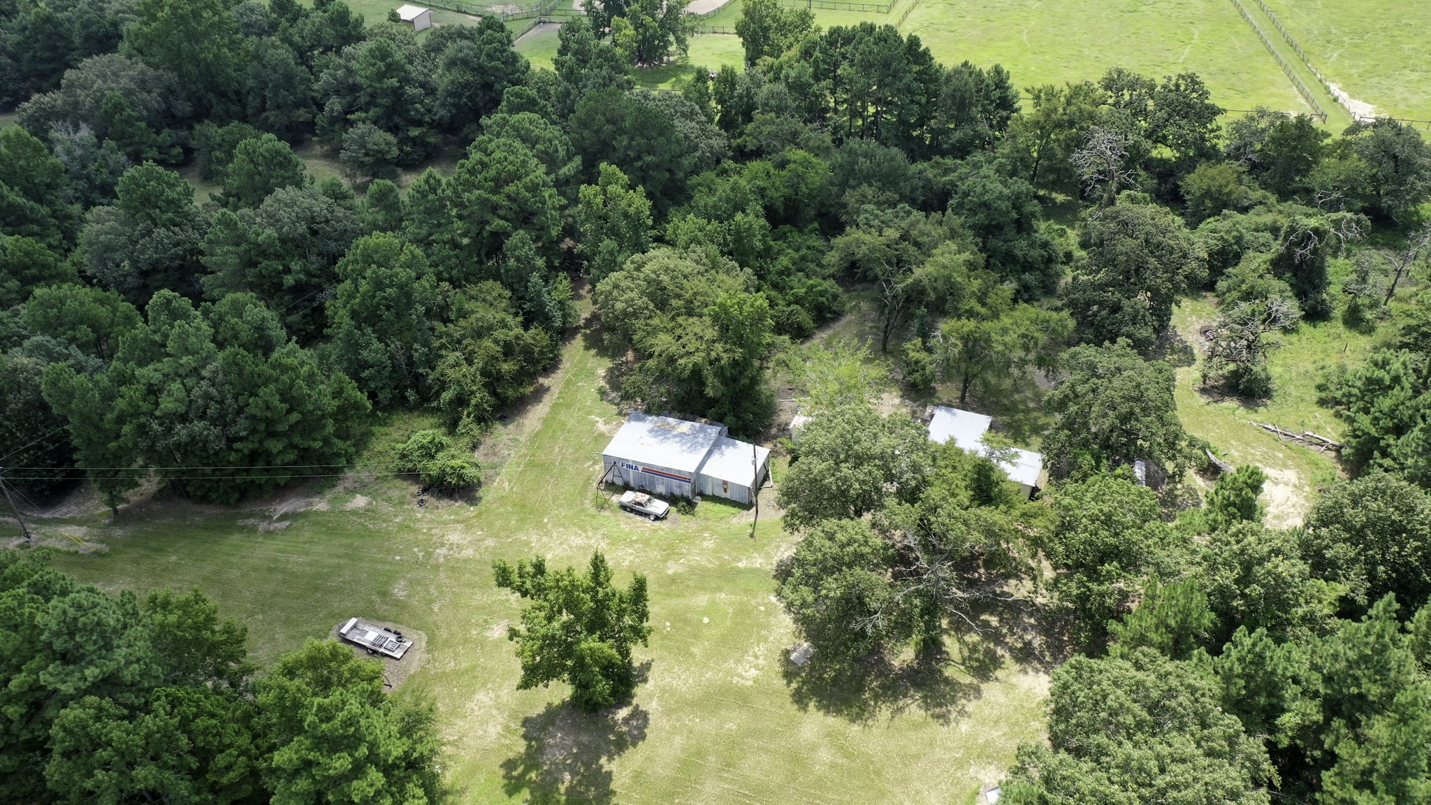 8374 Cattle Trail Road Midway, TX 75852 - Photo 6 of 16 an aerial view of residential house with outdoor space and trees all around