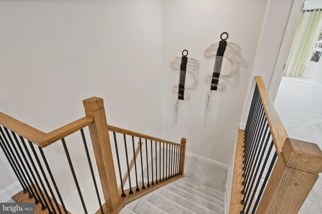 a view of a hallway with a window