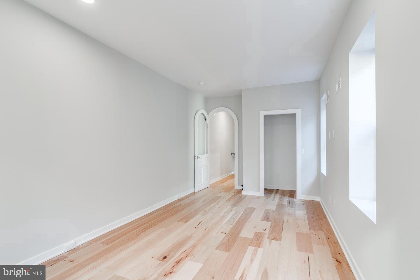 1503 North 29th Street Philadelphia, PA 19121 - Photo 25 of 27 a view of a room with wooden floor and white walls