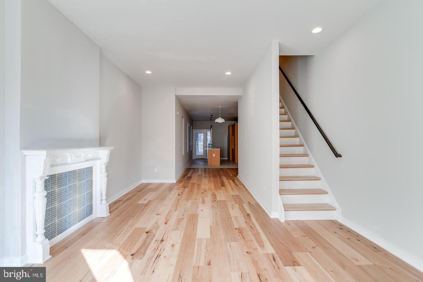 1503 North 29th Street Philadelphia, PA 19121 - Photo 27 of 27 a view of a bedroom with wooden floor and staircase