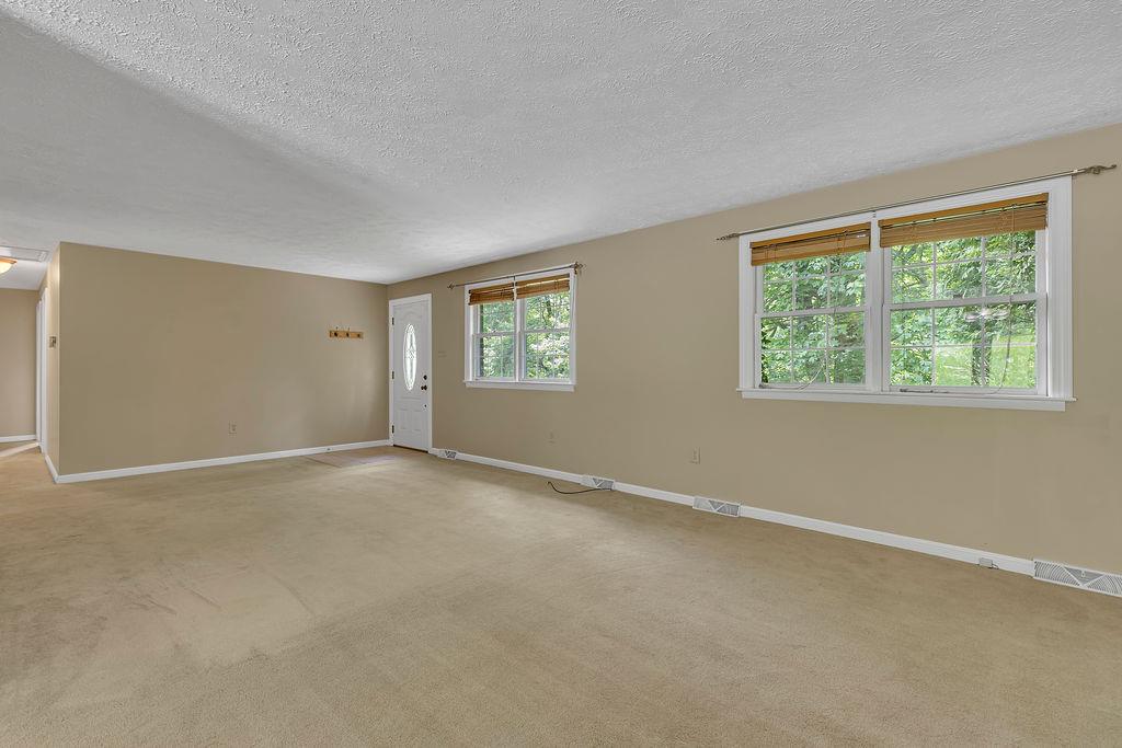171 Dehaven Road Beaver Falls, PA 15010 - Photo 6 of 35 a view of an empty room with a window