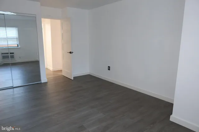a view of a livingroom with wooden floor