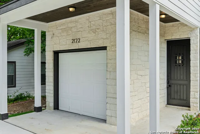 a view of a kitchen from the hallway