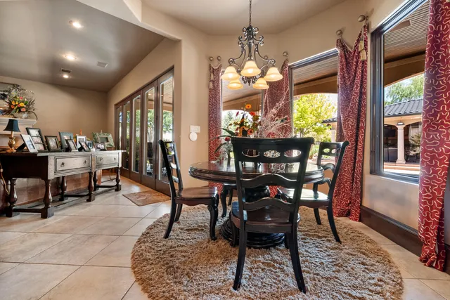 a living room with furniture a fireplace and a piano