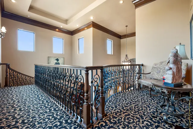 a view of house with backyard and a garden