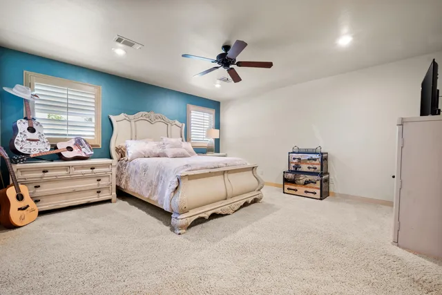 a view of an chairs and tables in the balcony