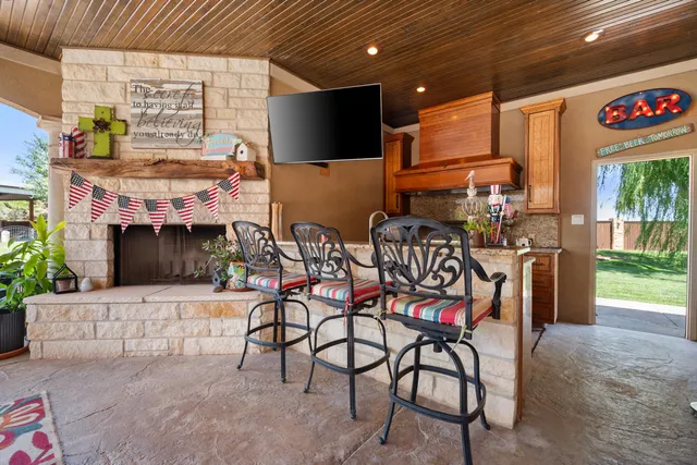 a room with a door and a potted plant on the wall