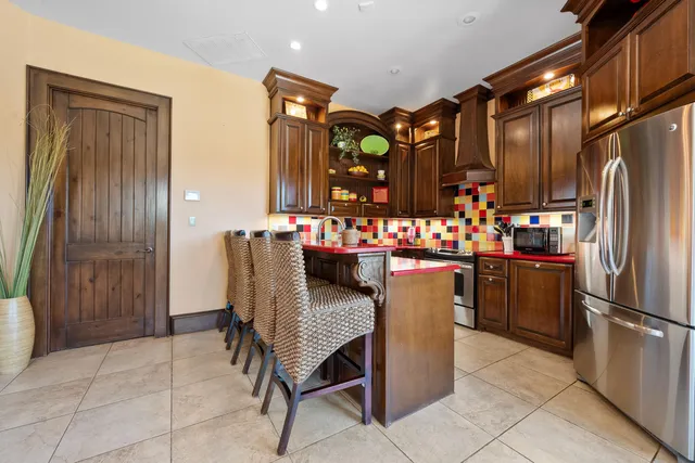 a view of a park with large trees