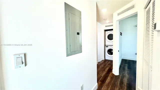 a bathroom with a sink and a shower curtain