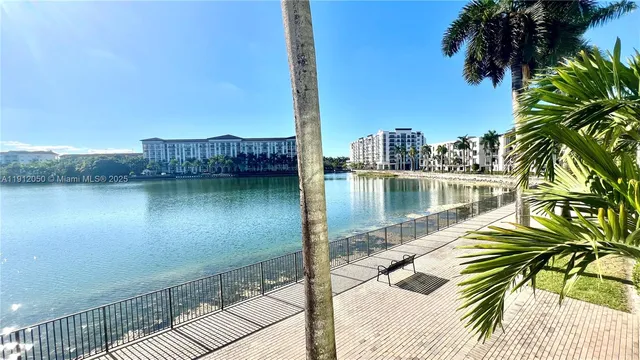 a view of a lake with a city from a terrace