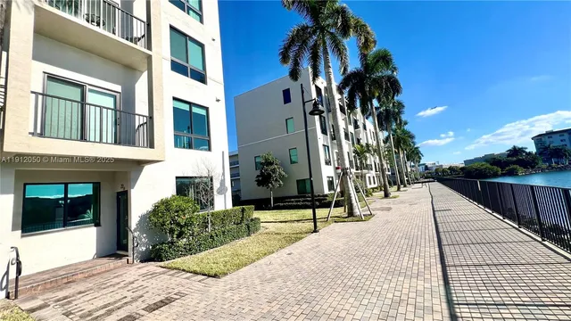 a view of a building with a tree