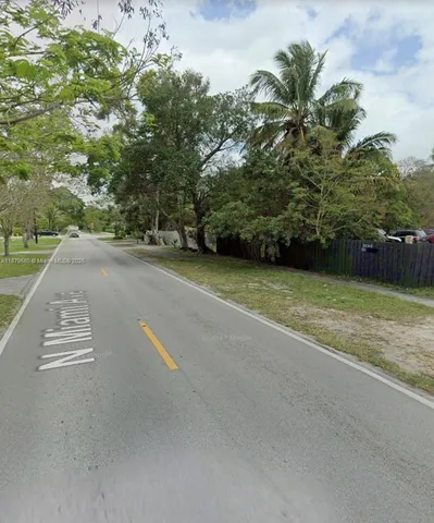 a view of street with green space