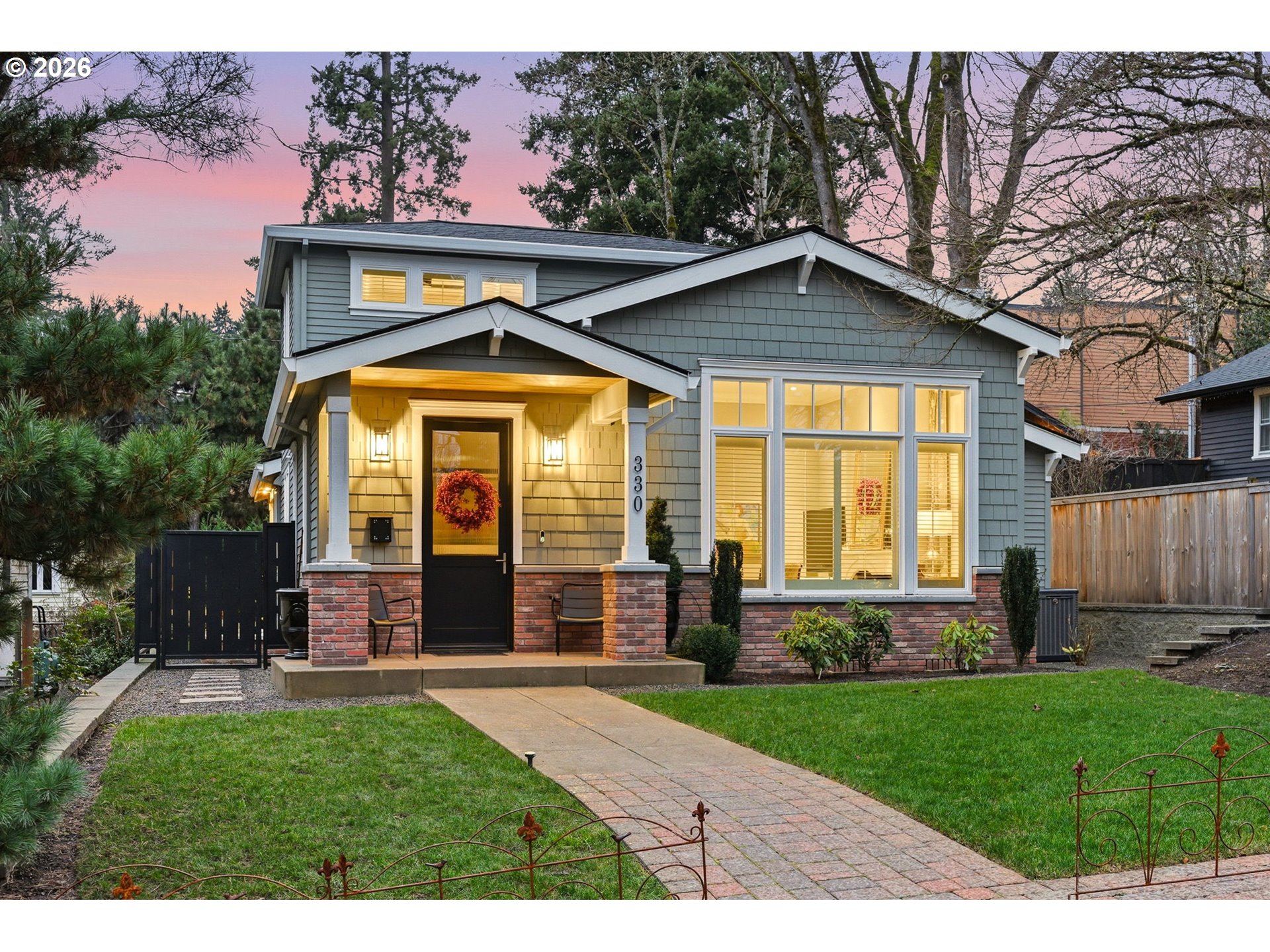330 6th Street Lake Oswego, OR 97034 - Photo 1 of 48 a view of a house with a small yard and a large tree