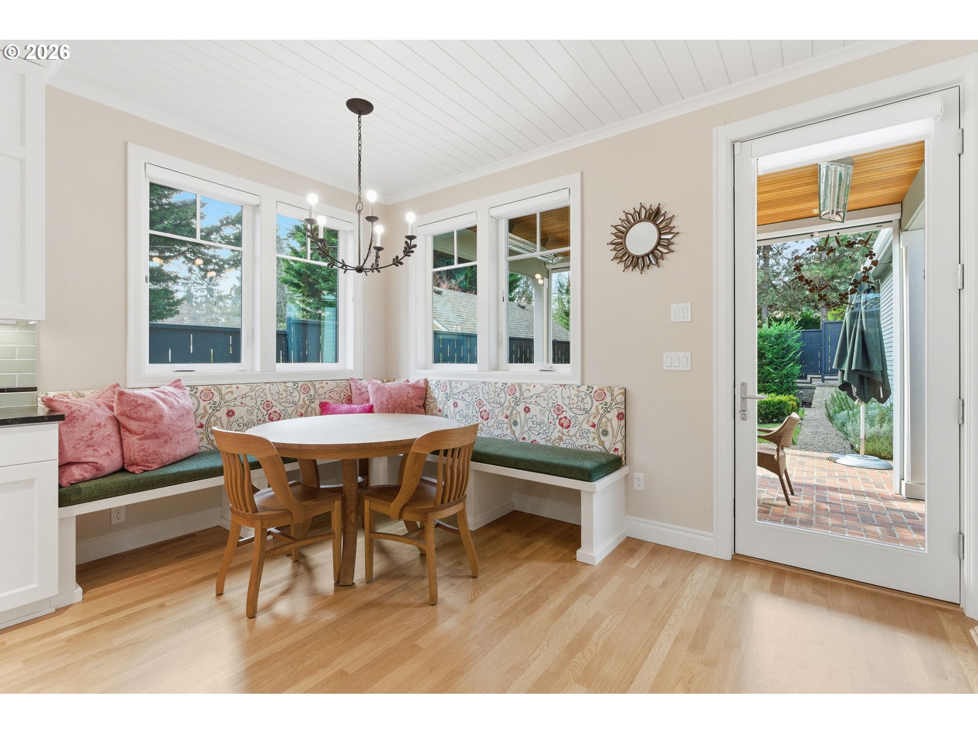 330 6th Street Lake Oswego, OR 97034 - Photo 15 of 48 a view of a dining room with furniture wooden floor and a chandelier