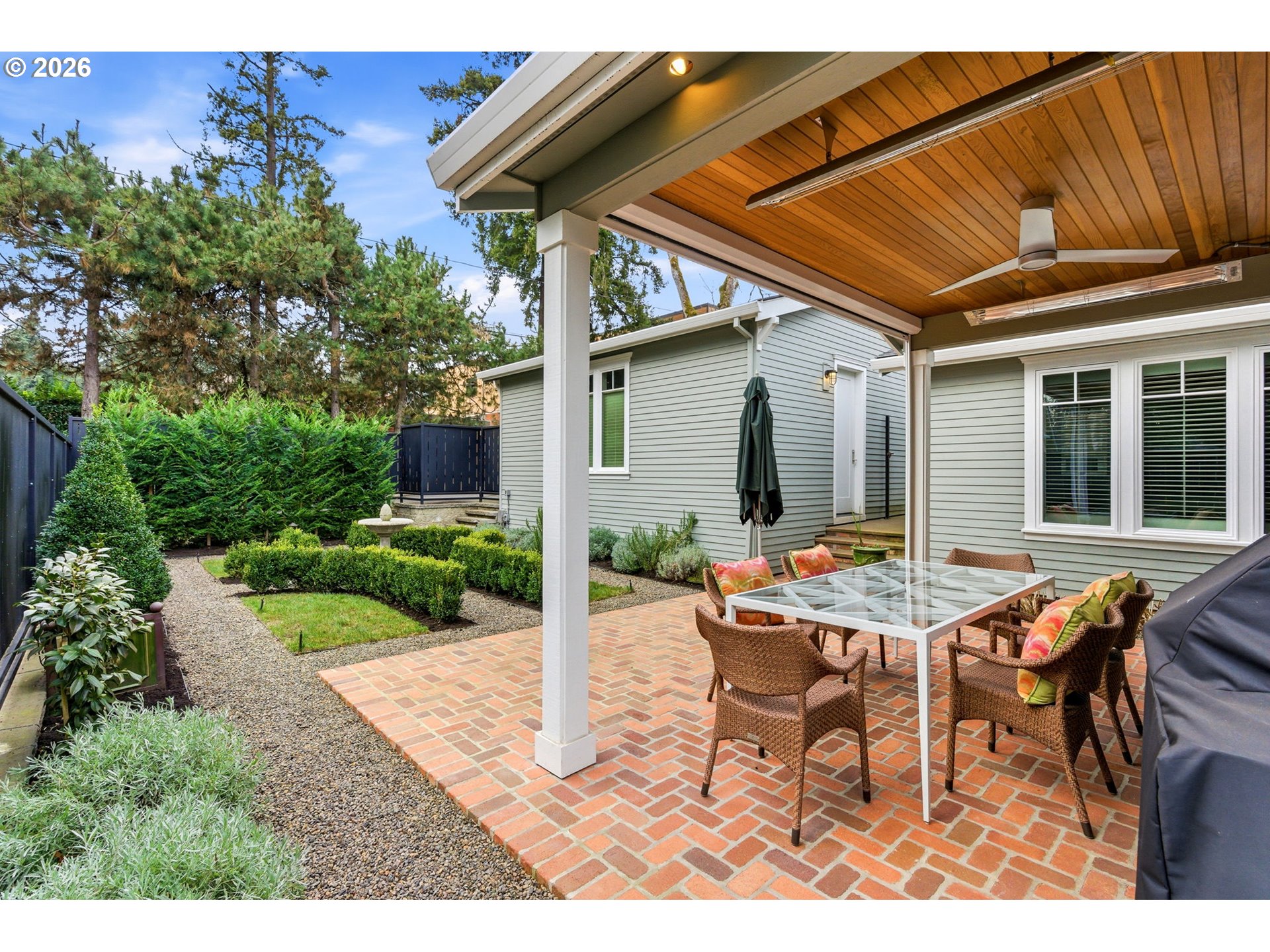 330 6th Street Lake Oswego, OR 97034 - Photo 16 of 48 a view of a patio with table and chairs and potted plants