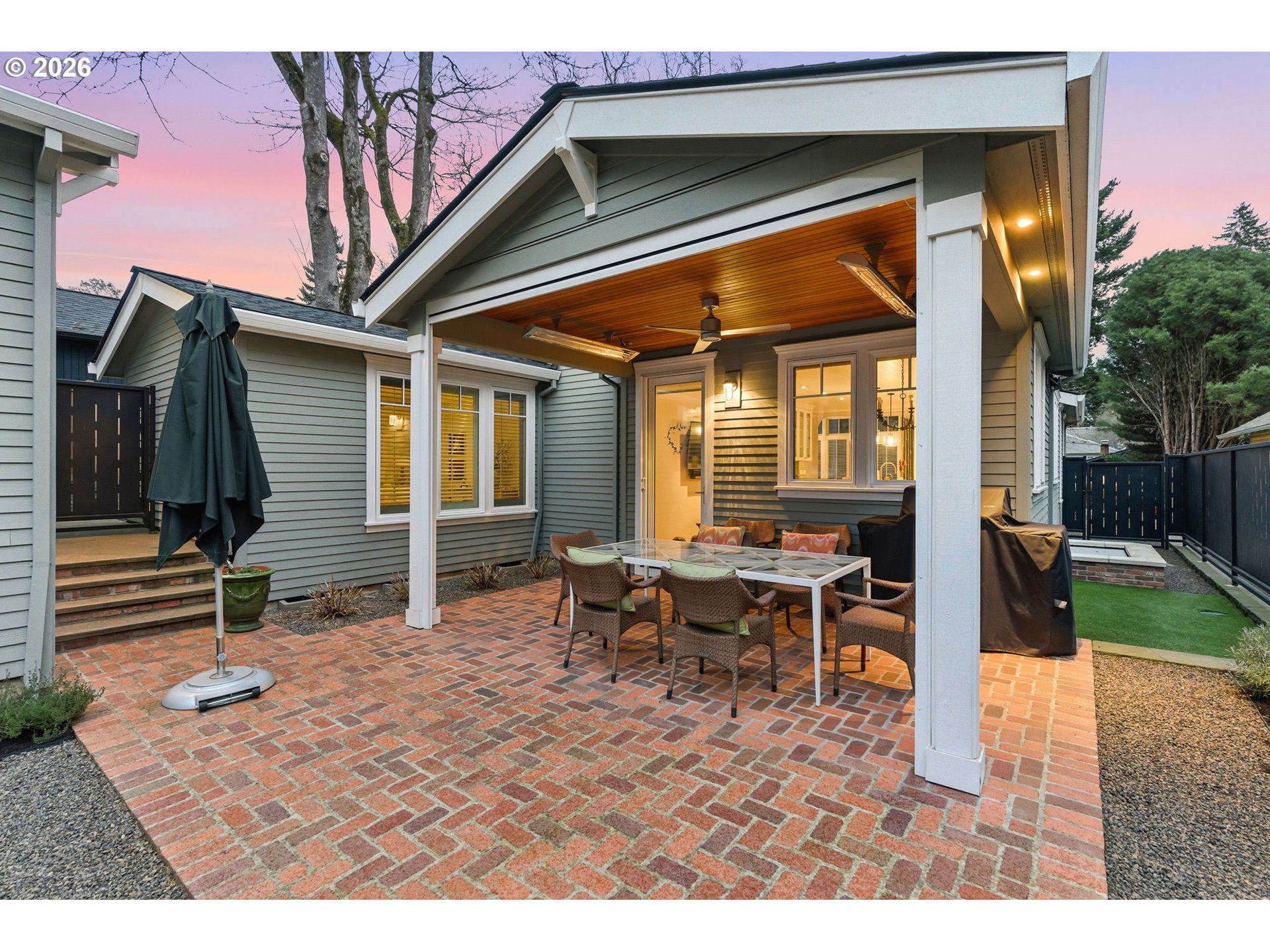 330 6th Street Lake Oswego, OR 97034 - Photo 17 of 48 a backyard of a house with table and chairs