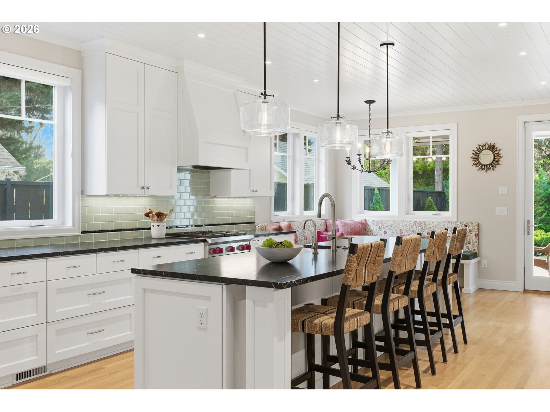 330 6th Street Lake Oswego, OR 97034 - Photo 20 of 48 a kitchen with a table chairs sink and cabinets