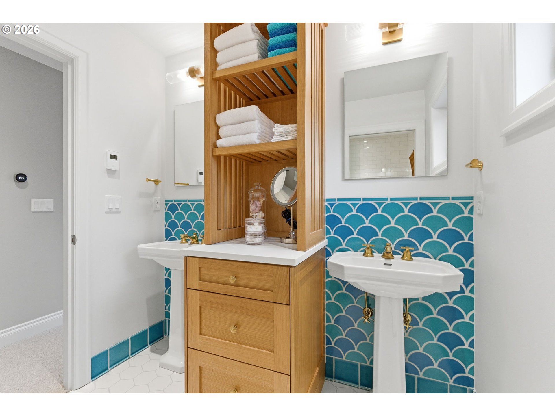 330 6th Street Lake Oswego, OR 97034 - Photo 34 of 48 a view of bathroom with a sink and a mirror