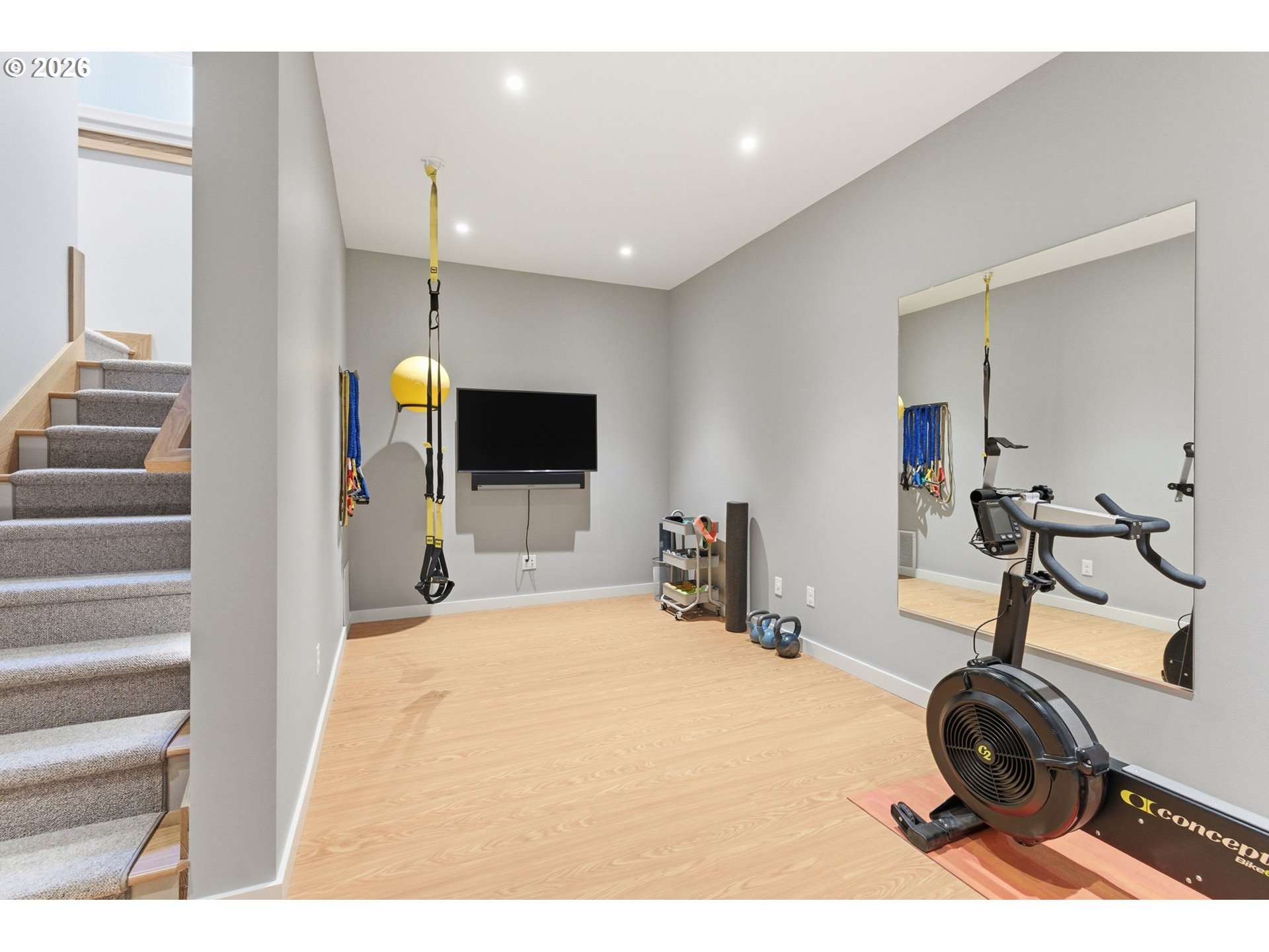 330 6th Street Lake Oswego, OR 97034 - Photo 38 of 48 a room with gym equipment and a mirror