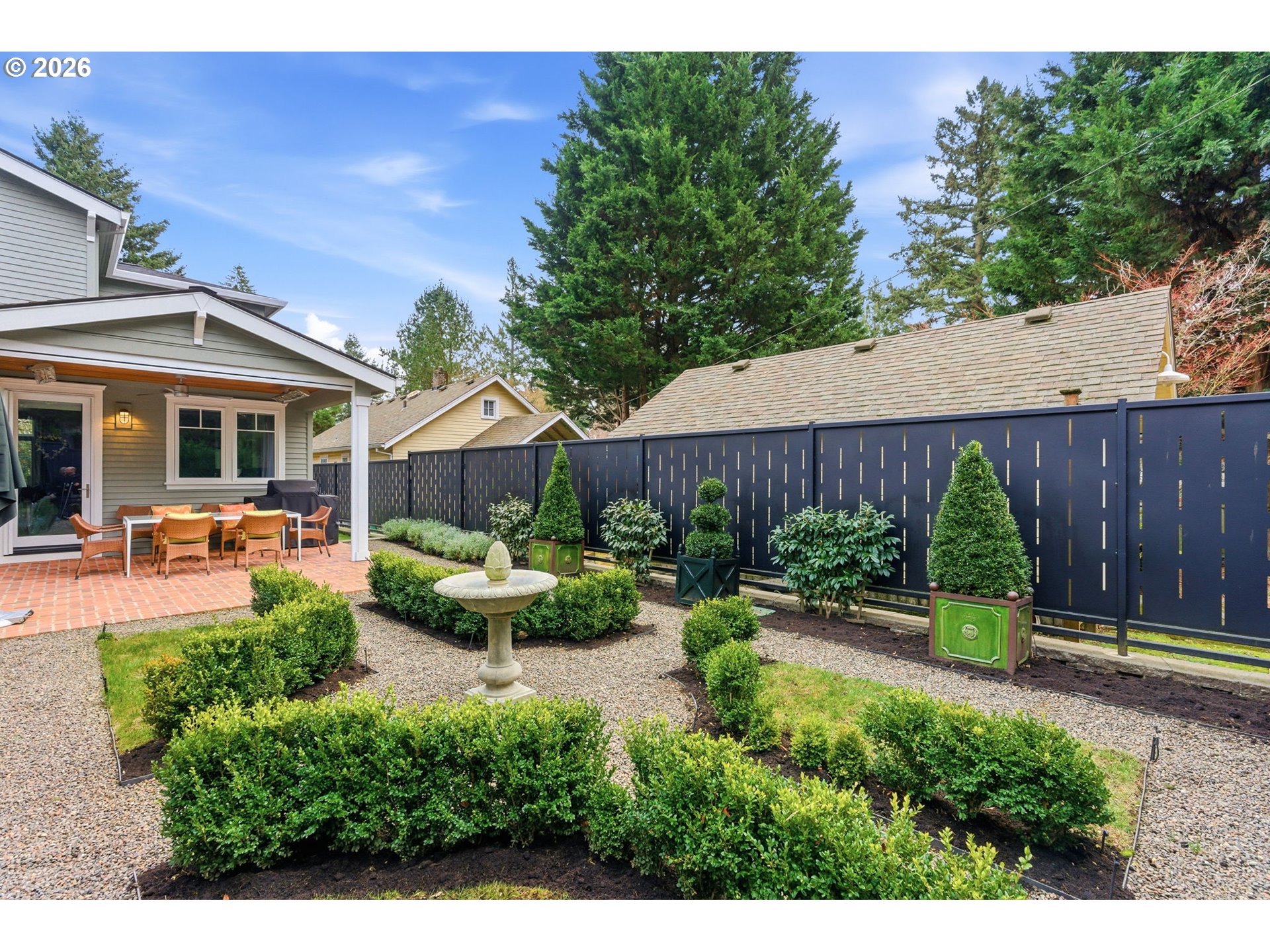 330 6th Street Lake Oswego, OR 97034 - Photo 45 of 48 a front view of a house with garden and sitting area