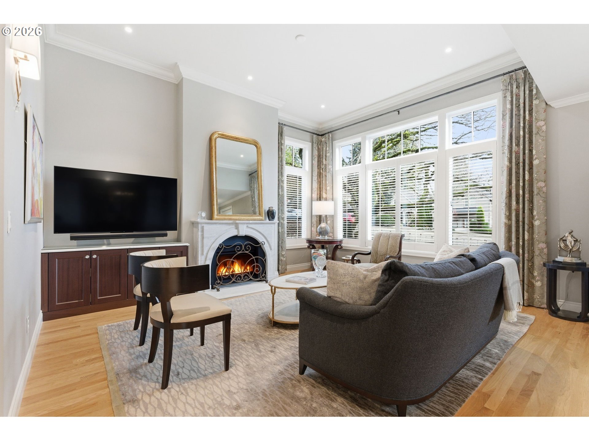 330 6th Street Lake Oswego, OR 97034 - Photo 5 of 48 a living room with furniture a flat screen tv and a fireplace