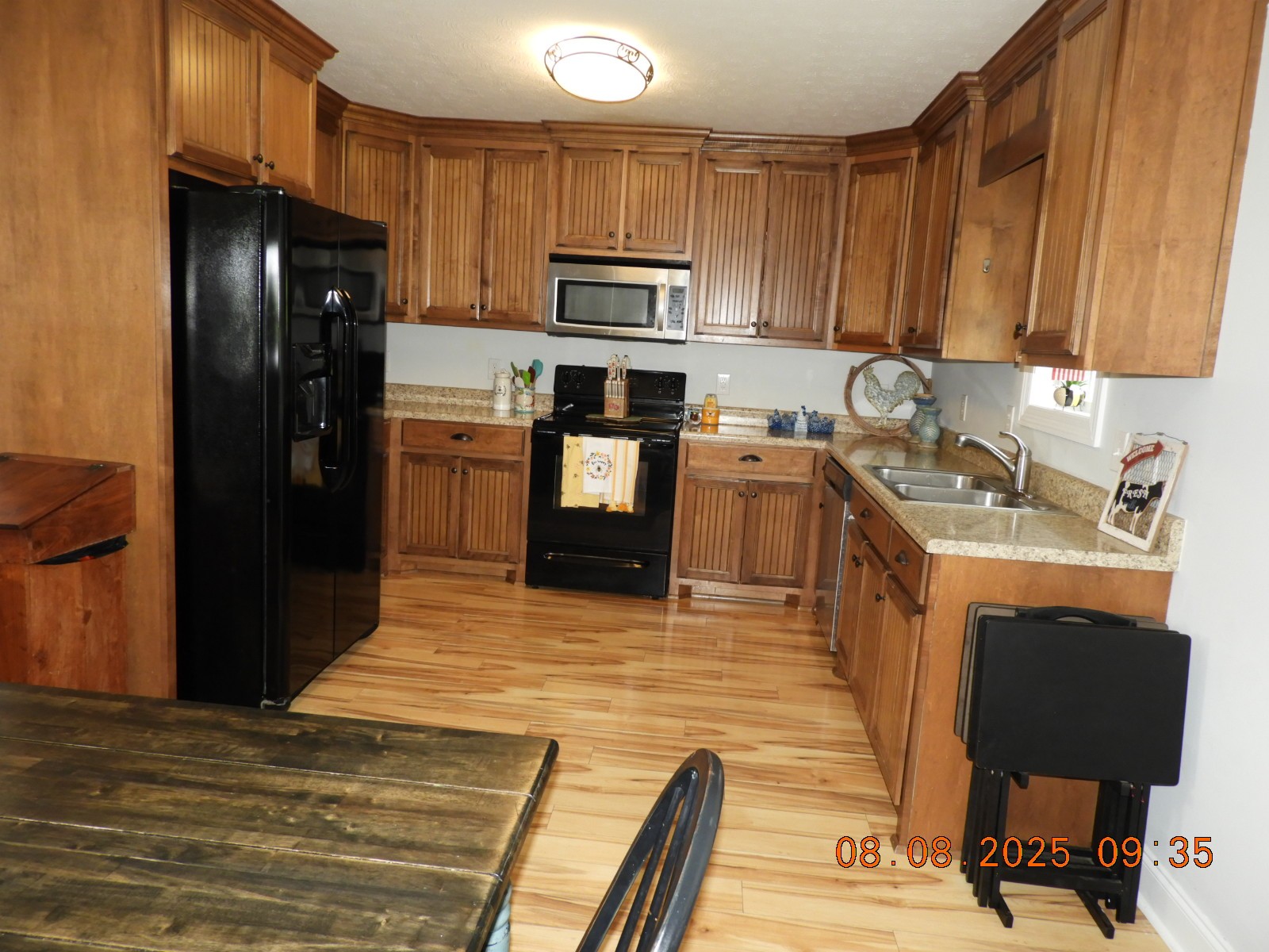 202 Desperado Avenue Pulaski, TN 38478 - Photo 16 of 35 a kitchen with granite countertop a refrigerator stove top oven and sink