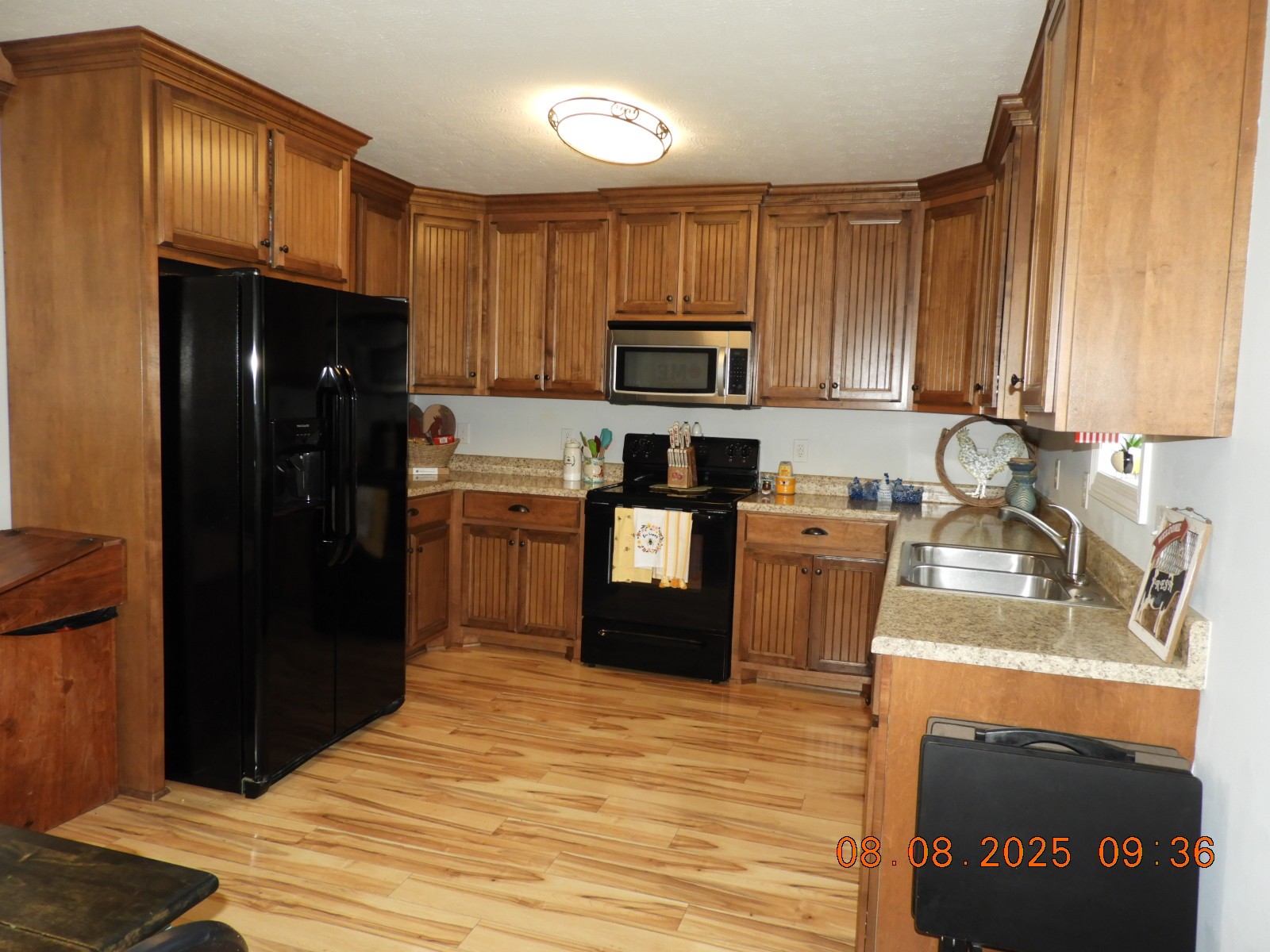202 Desperado Avenue Pulaski, TN 38478 - Photo 17 of 35 a kitchen with granite countertop a refrigerator stove and sink