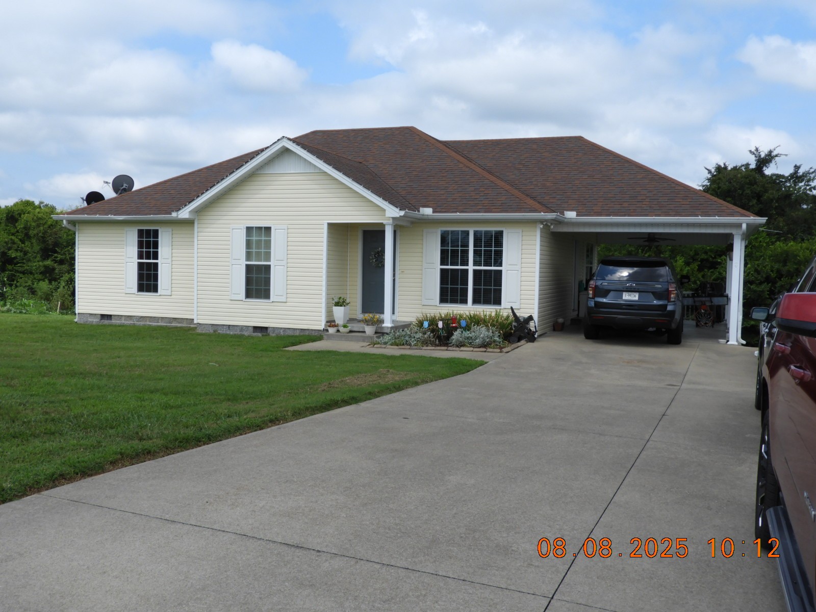 202 Desperado Avenue Pulaski, TN 38478 - Photo 7 of 35 a view of a white house with a yard