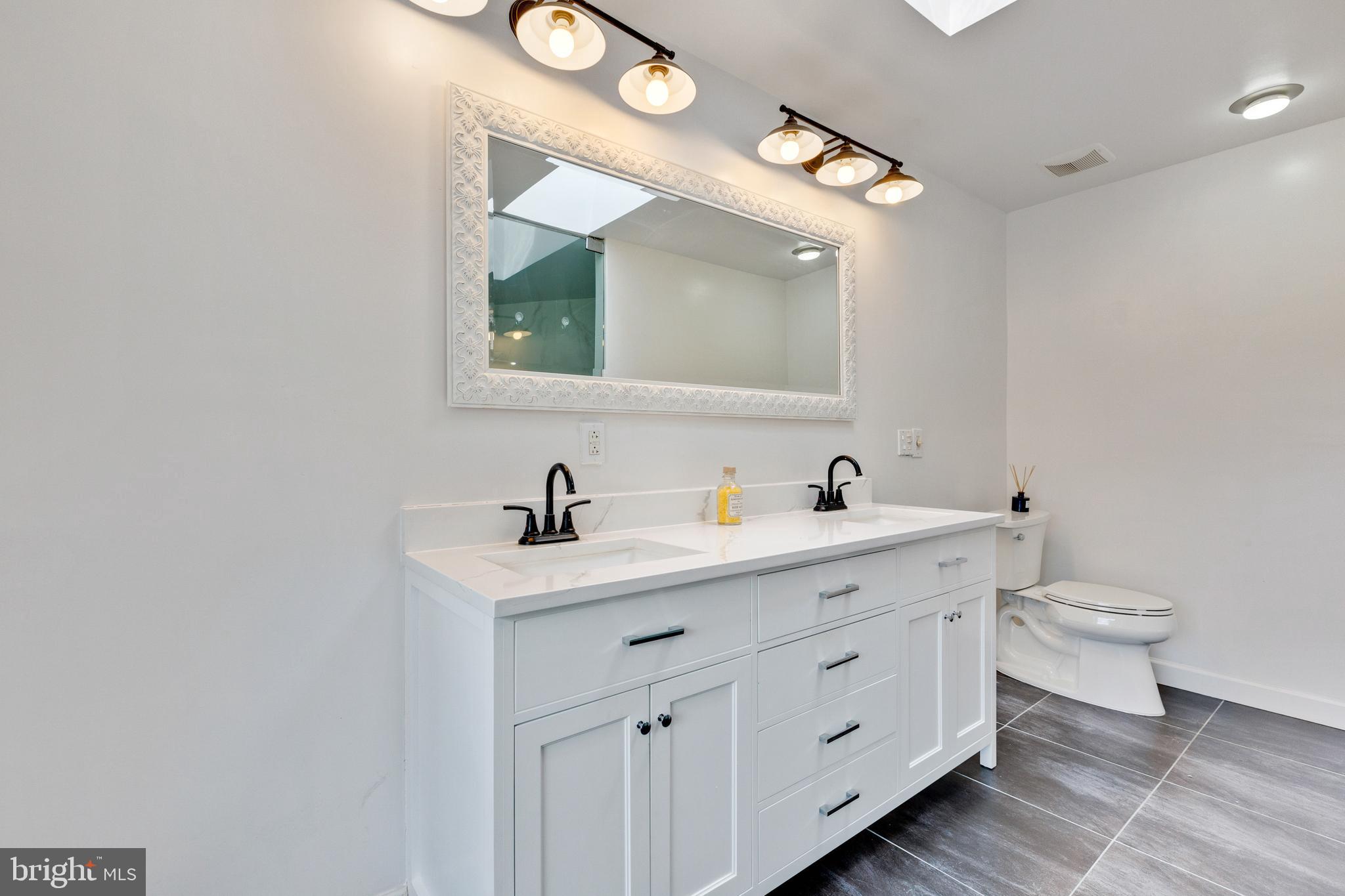 13528 Potomac Riding Lane Rockville, MD 20850 - Photo 37 of 80 Owners Bath- double vanities with quartz counters