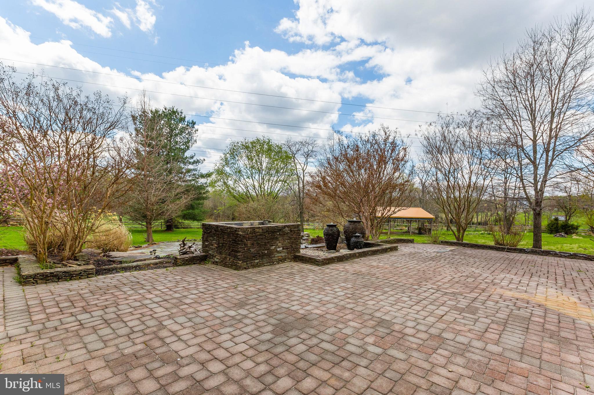 13528 Potomac Riding Lane Rockville, MD 20850 - Photo 70 of 80 Patio with fountains