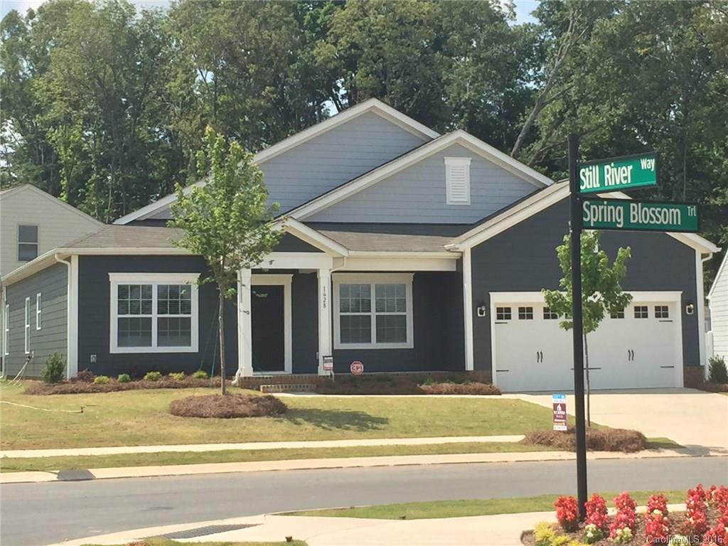 1628 Spring Blossom Trail, Unit SITE 18 Fort Mill, SC 29708 - Photo 1 of 22 a view of a house with a swimming pool
